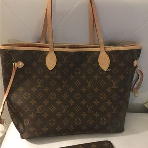 Never used brown outside red inside with  clutch